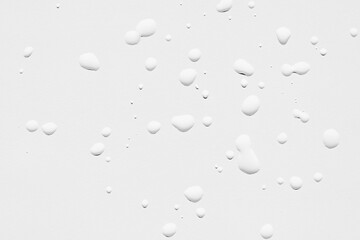 Water drops on white background, macro