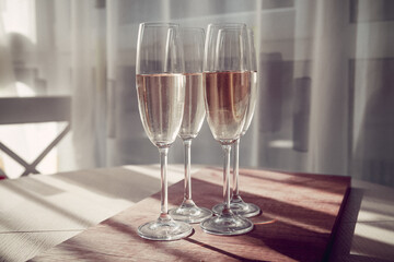 four glasses of French champagne, on the table