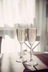 two glasses of French champagne, on the table