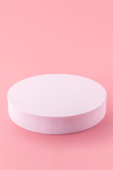Solid Display Block for Shop Windows on pink background, empty podium for product presentation, geometric stand for cosmetics