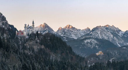 Sunrise in the mountains at Castle Neuschwanstein - obrazy, fototapety, plakaty