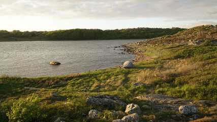 Wild camping at the beach on Styrsö Island at sunset near Gothenburg City in Sweden.