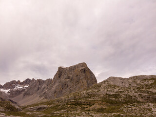 The upper start section of hiking track PR-PNP 24 to the magnificient summits of Mounts Pena Remona, Torre de Salinas, La Padierna and Pico de San Carlos at Picos de Europa National Park, Spain.