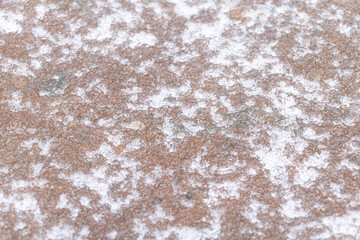 Obraz premium Ice texture - melted snow on a sheet of metal