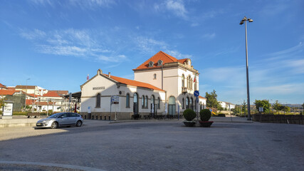 Fototapeta na wymiar Braganca, Portugal - August 31, 2020: Braganca's bus station. This building is in fact the old railway station and is in the centre of the newer part of town.