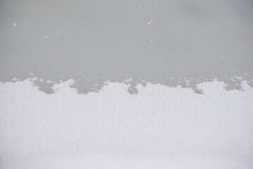 Snow Ice Gradient. Edge of a pond.