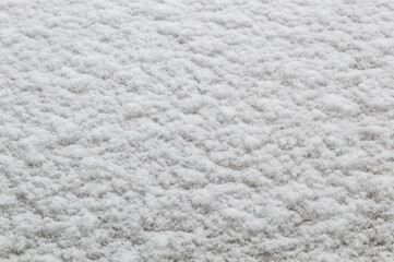 winter background: fresh clean even snow, large snowflakes