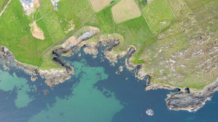 Obraz na płótnie Canvas Aerial view over the Roundstone Coastline on the West Coast of Ireland. I named it the 