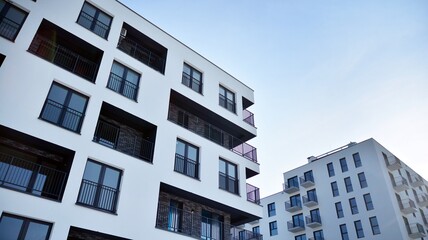 Modern apartment building in sunny day. Exterior, residential house facade.