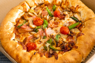 Pizza for one person. Mini pizza in a box. Food delivery
