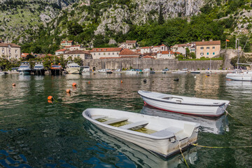 Fototapeta na wymiar Boats in Kotor marina, Montenegro.