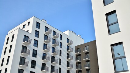 Modern apartment building in sunny day. Exterior, residential house facade.