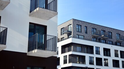 Modern apartment building in sunny day. Exterior, residential house facade.