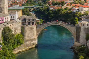 MOSTAR, BOSNIA AND HERZEGOVINA - JUNE 10, 2019: Stari most (Old Bridge) over Neretva river in Mostar. Bosnia and Herzegovina
