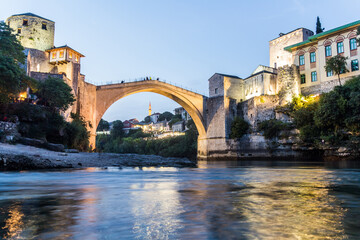 Evening view of Stari most (Old Bridge) and old stone buildings in Mostar. Bosnia and Herzegovina