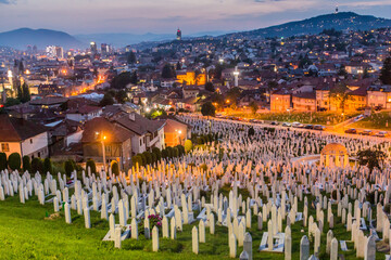 Evening view of city skyline with Kovaci cemetery in Sarajevo. Bosnia and Herzegovina