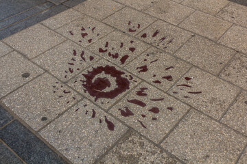 Rose of Sarajevo marking a place of mortar shells explosions during the Siege of Sarajevo in Bosnia and Herzegovina.