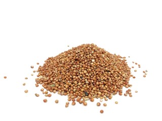 buckwheat on white background Sorghum millet grain pile on white background

