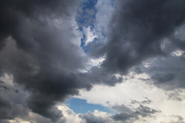 Epic Dramatic Storm sky, dark grey clouds background texture, thunderstorm