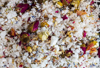 close up of bath salt with dry flowers