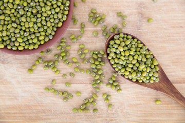 A plate of mung beans and a spoonful of mung beans