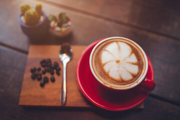 Hot Coffee up on plate at coffee shop.