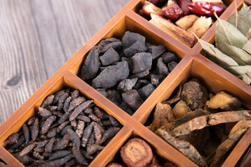Looking down at all kinds of traditional Chinese medicine in wooden box