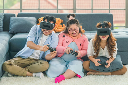 Down Syndrome Teenage Girl Play 3d Vr Console Game Together With Family