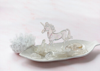 clear quartz minerals and crystal unicorn. Magic gemstones for Crystal Ritual. Witchcraft,...