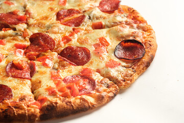Pepperoni pizza isolated on white background. Italian food concept. Appetizing pizza.