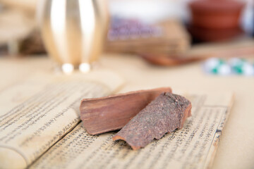 Cinnamon, pestle and other articles in ancient books of traditional Chinese Medicine