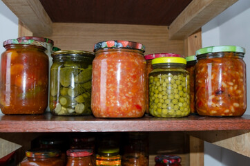 Fototapeta na wymiar home salting. jars of pickles