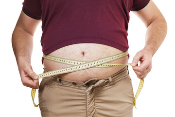 Overweight man measures his waist with a measuring tape, isolated on white background. Concept on the topic of excess weight