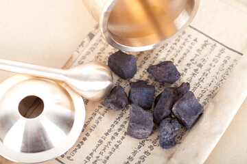 Radix Polygoni Multiflori, medical books and medical pestle