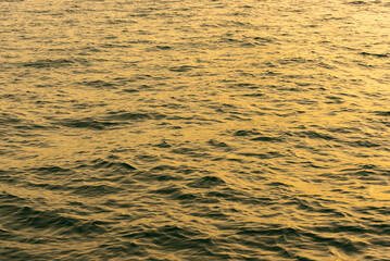 Sea surface background image at sunset
