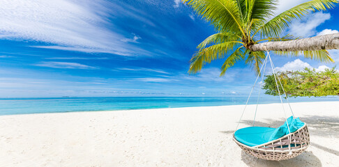 Tropical beach background as summer relax landscape with beach swing or hammock and white sand and...