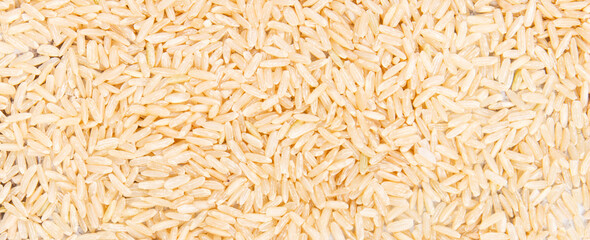 Brown rice as background, healthy gluten free food concept