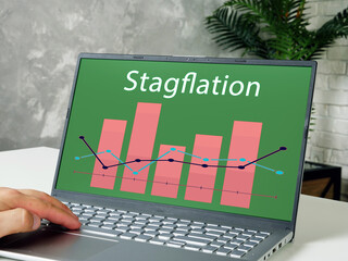  Stagflation phrase on the piece of paper.