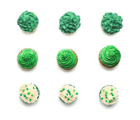 Tasty cupcakes for St. Patrick's Day on white background