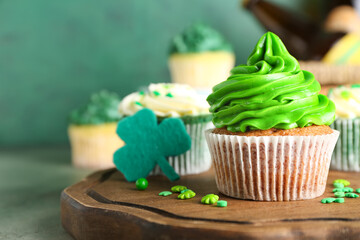 Tasty cupcakes for St. Patrick's Day on table