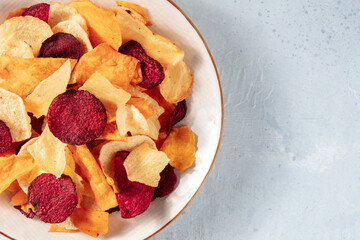 Fruit and vegetable chips, close-up with a place for text