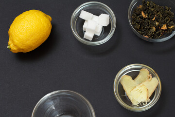 Health remedy foods for cold and flu relief on a black background.