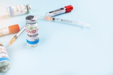 Covid-19 Corona Virus 2019-ncov vaccine vials medicine drug bottles syringe injection. Vaccination,...