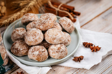 Pile of russian gingerbread cookies on the wooden decorated table