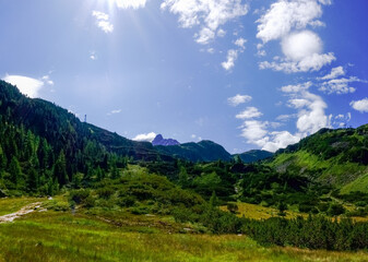 Fototapeta na wymiar hiking trail in wonderful green mountains on vacation panorama