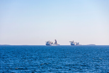 Ships on the horizon at sea