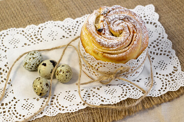 Easter Cake - Russian and Ukrainian Traditional Kulich with easter eggs on a light grey background Bread Selective focus