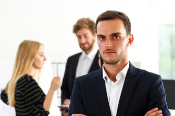 Handsome man in suit and tie look in camera hands crossed on chest isolated background. White collar dress code, modern office lifestyle, graduate college study, profession idea, coach train concept