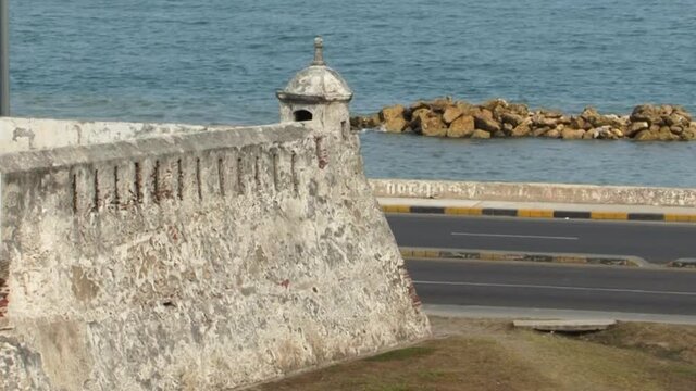 The sea and the Watchtower of the fortress of Castillo de San Felipe de Barajas, Cartagena, Colombia.