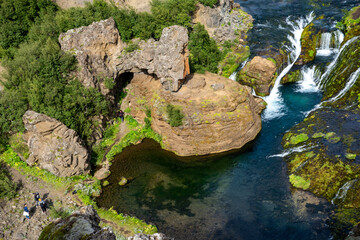  Scenic landscape of Hjalparfoss on the South of Iceland